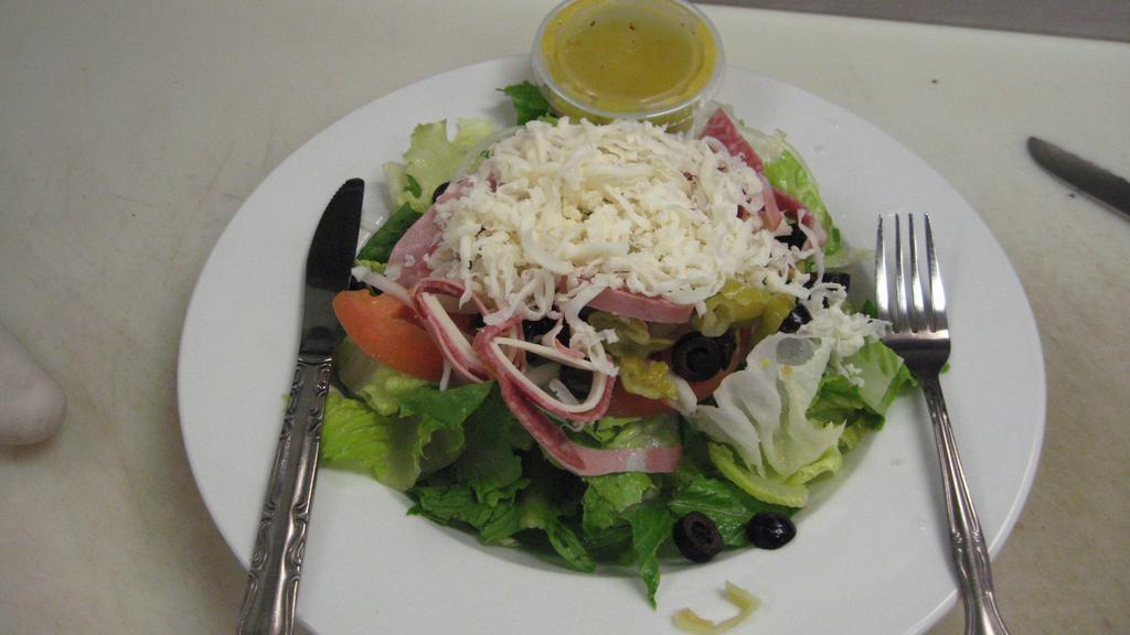 Antipasto Salad · Lettuce, tomato, black olives, pepperoncini, salami, mortadella, provolone and mozzarella.