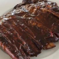 Half Rack   Ribs · TRY OUR AUTHENTIC SLOW COOKED BBQ RIBS WITH TWO SIDES OF YOUR CHOICE! BABY BACK, ST. LOUIS, ...
