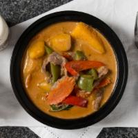 . Mango Curry · Bell peppers, onions, carrots, eggplant, mango, and basil.