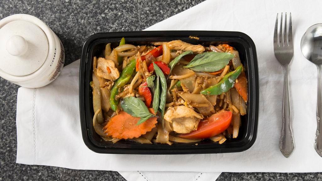 . Drunken Noodles · Stir fried flat rice noodles with chili, onions, bell peppers, bamboo shoots, carrots, Chinese broccoli, and eggs.