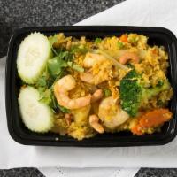 . Pineapple Fried Rice · Stir fried rice with chicken, shrimp, cashew nuts, pineapple, peas, carrots, onions, broccol...