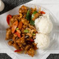 . Cashew Chicken · Garlic, diced onions, carrots, bell peppers, cashews, and mushrooms. Served with rice.