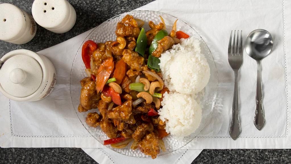 . Cashew Chicken · Garlic, diced onions, carrots, bell peppers, cashews, and mushrooms. Served with rice.