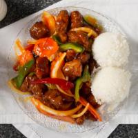 . Sweet & Sour Pork · Crispy fried pork sautéed with sweet and sour sauce, onions, bell peppers, and pineapple. Se...
