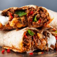 Grande Loaded Burrito · Any choice of meat, rice, beans, cilantro, onions, salsa.