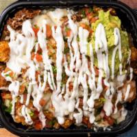 Famous Tater Tots · Large order of golden tater tots topped with your choice of meat, pico, guac, and sour cream.