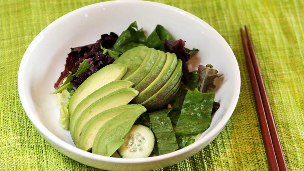 Avocado Salad · Garden salad with sliced avocado.