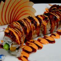 Dragon Roll · California roll whole eel, fish roe on the top.
These items are cooked to order or may conta...