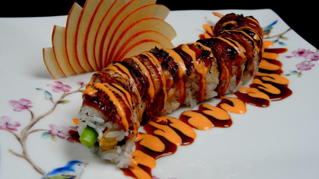 Dragon Roll · California roll wrapped with eel.