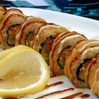 Dynamite Roll · California roll, baked spicy scallops, cream cheese, fish roe.