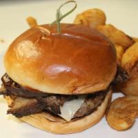 Brisket Burger · ½ pound beef patty, smoked brisket, garlic aioli, Monterey jack cheese, caramelized onions. ...