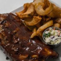 Full Rack - Braised Sticky Ribs · Baby back ribs smothered in our house BBQ sauce. Served sweet or spicy with a sweet slaw and...
