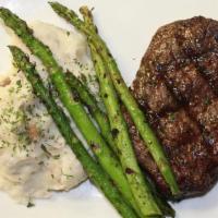 10 Oz Top Sirloin · Grilled to order, served with parmesan garlic red mashed potatoes and grilled asparagus