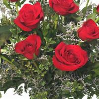 Classic Dozen Roses · This vase of brilliant red roses is an elegant and natural way to say, 