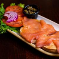 Smoked Salmon Bagel. · norwegian smoked salmon, sliced tomato, capers & red onion on the side