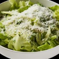 Caesar Salad. · Romaine lettuce, parmesan cheese, croutons, & caesar dressing