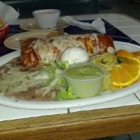 Colima Burrito · Served with your choice of meat, rice beans, Pico de Gallo, guacamole fries, sour cream, che...