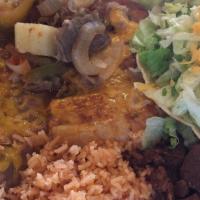 #4 Combination · Beef Quesadilla, Chile Relleno, Pork Tamale, Chile Colorado, and Steak Ranchero.