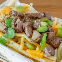 French Fries With Filet Mignon Shaken Beef · French fries come with melted cheese, garlic seasoning, grilled Fillet Mignon Beef, bell pep...