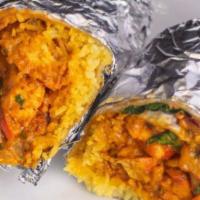 Chana Masala Burrito · Indian fusion burrito loaded with French fries, chana masala, rice, veggies, and a secret in...