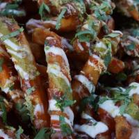 Masala Fries · Family size French fries topped with our secret sauces!!!(serves 2)