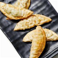 Plant-Based Fried Dumplings · 7 Pieces. Plant-based soybean protein.