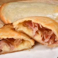 Ham And Cheese Empanada · Sliced Ham, Mozzarella, Ricotta, Parmesan and Provolone.