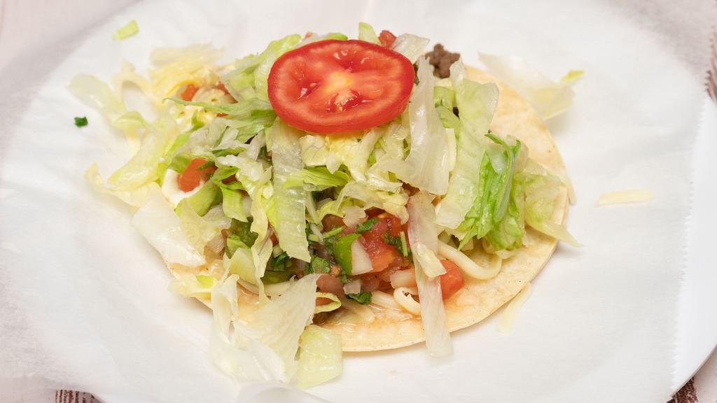 Super · Choice of meat, cheese, guacamole, sour cream, lettuce, tomatoes on soft tortilla.