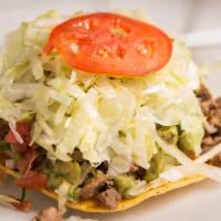 Regular · Choice of meat, refried beans, lettuce, sour cream, guacamole, salsa, tomatoes.