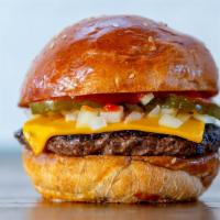 The Original Burger · American cheese, pickles, onion, mustard, ketchup.