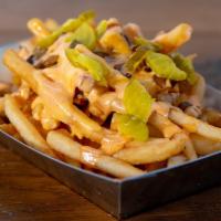 Shop Fries · Melted cheese, pickles, caramelized onions, burger shop dressing
