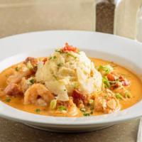Shrimp And Grits · Shrimp sautéed with house-made Creole seasoning in a Tasso ham cream sauce, with a splash of...
