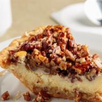 Creole Pecan Pie · A delicious nutty dessert reminiscent of pecan pie, topped with a cream cheese frosting and ...