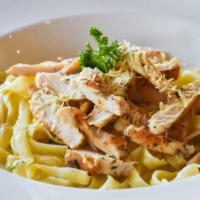Cajun Chicken Fettuccine Alfredo · Juicy grilled Cajun chicken is served warm on a bed of fettuccine pasta tossed with rich Alf...