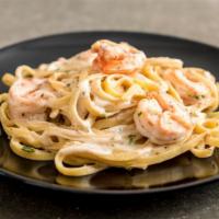 The Shrimp Fettuccine Alfredo · Delicious pasta dish made with seasoned shrimp and fettuccine pasta tossed in a creamy Alfre...