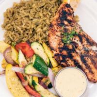 Blackened Salmon · Wild-caught Atlantic Salmon, with brown rice, and grilled vegetables.