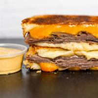 Roast Beef & Three Cheese Melt · Roast Beef, Cheddar, Swiss, and Parmesan cheeses melted between buttery, toasted sourdough b...