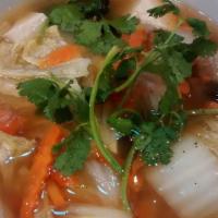 Home- Styled Meatball Soup · Our house special meatball soup consisting of marinated ground pork infused with glass noodl...