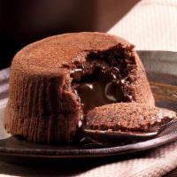 Chocolate Soufflé · Moist chocolate cake with a heart of creamy rich chocolate. This dessert is best warm with a...