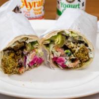 Falafel Wrap · Includes lettuce, tomatoes, tzatziki sauce, onion and cucumber.