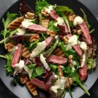 Pear & Gorgonzola Salad · Mixed greens with fresh pear, gorgonzola, and candied walnuts. Tastes excellent with balsami...