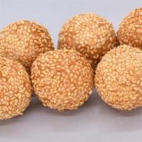 T4 Sesame Balls · Perfectly fried sesame balls with a crunchy outer layer and red bean filled inside.