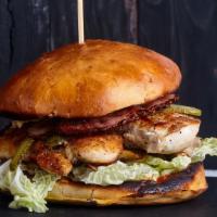 Bbq Chicken Sandwich · Delicious sandwich made with pieces of tender chicken breast with grilled onions, BBQ sauce ...
