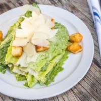 Caesar Salad · Romaine lettuce, shaved parmesan, creamy Caesar dressing. Add Anchovies 1 | Chicken 5 | Salm...