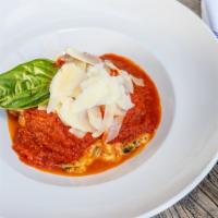 Short Rib Lasagna · Fresh pasta layered with a blend of ricotta, parmesan cheese, mozzarella, marinara sauce