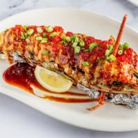Jumbo Lobster Tail · Jumbo lobster tail served with sautéed vegetables, mashed potatoes and drum butter