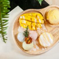 Omg [Oh-Man-Go] · Fresh mango, sticky rice, mango pudding and choice of ice cream: mango, coconut or vanilla b...