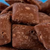 Chocolate Honeycomb (1/2 Lb) · Dark chocolate coconut macaroon almonds. Wow, this amazing combination of flavors does not d...