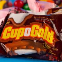Cup O' Gold · Around since the 1950s. This one comes in the form of a chocolate disc/cup (like a big peanu...