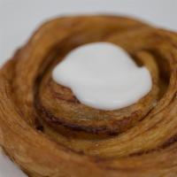 Cinnamon (No Dairy & Nuts) · Extra light and flaky pastry rolled with lots of cinnamon and topped with a bit of icing.